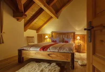 Ein Bett oder Betten in einem Zimmer der Unterkunft Chalets zum Ilsetal - Brocken-Chalet