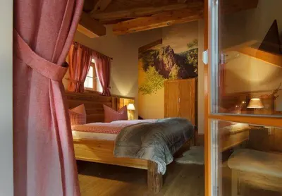 Ein Bett oder Betten in einem Zimmer der Unterkunft Chalets zum Ilsetal - Ilse-Chalet