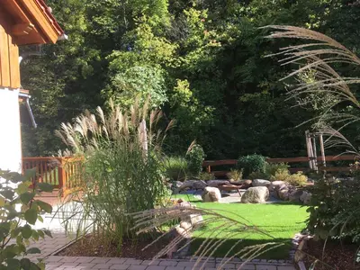 Ein Garten an der Unterkunft Chalets zum Ilsetal - Ilse-Chalet