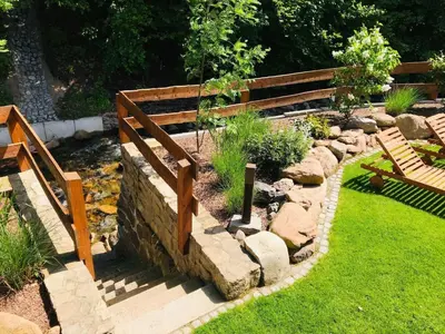 Ein Garten an der Unterkunft Chalets zum Ilsetal , Sport-Chalet