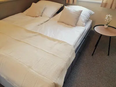 Ein Bett oder Betten in einem Zimmer der Unterkunft Haus Kuhlmann