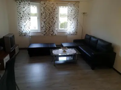 Ein Sitzbereich in der Unterkunft Ferienwohnungen Untermühle, Rothenbergerstr. 12