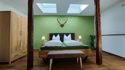 Ein Bett oder Betten in einem Zimmer der Unterkunft Traditions - Hotel 