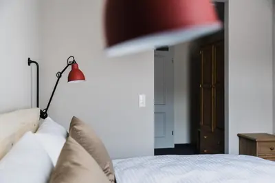 Ein Bett oder Betten in einem Zimmer der Unterkunft Hotel Villa Bodeblick