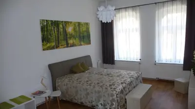 Ein Bett oder Betten in einem Zimmer der Unterkunft City-Ferienwohnung-Blankenburg