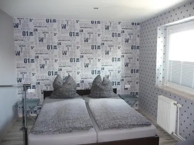 Ein Bett oder Betten in einem Zimmer der Unterkunft Harzurlaub