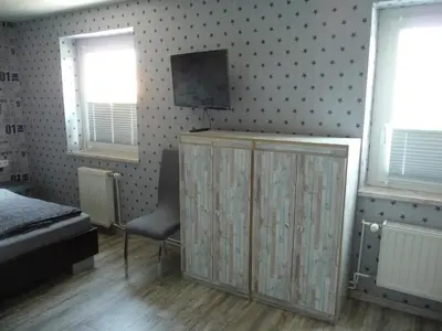 Ein Bett oder Betten in einem Zimmer der Unterkunft Harzurlaub