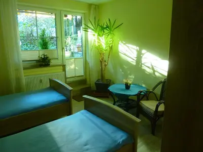 Ein Bett oder Betten in einem Zimmer der Unterkunft Ferienwohnung Kranich