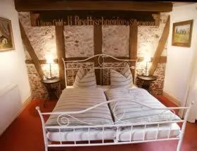 Ein Bett oder Betten in einem Zimmer der Unterkunft Pension Picco-Bello