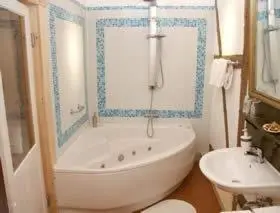 Ein Badezimmer in der Unterkunft Pension Picco-Bello