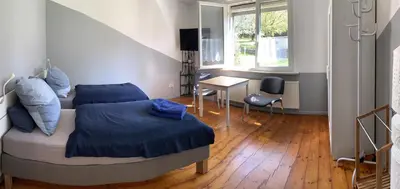 Ein Sitzbereich in der Unterkunft Monteurs Zimmer Noack