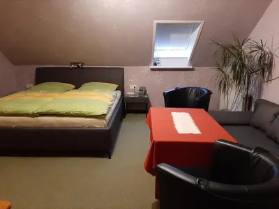 Ein Bett oder Betten in einem Zimmer der Unterkunft Ferienzimmer Wenzel