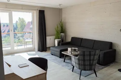 Ein Sitzbereich in der Unterkunft StrandBerg's Auberge Chalet Residences