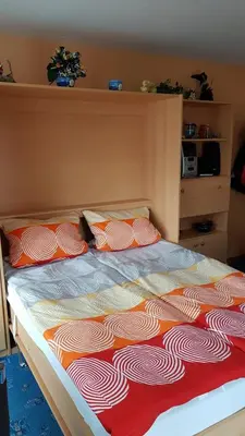 Ein Bett oder Betten in einem Zimmer der Unterkunft Wohnen wie bei Freunden