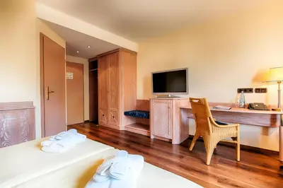 Ein Bett oder Betten in einem Zimmer der Unterkunft Hotel Villa Heine Wellness & Spa
