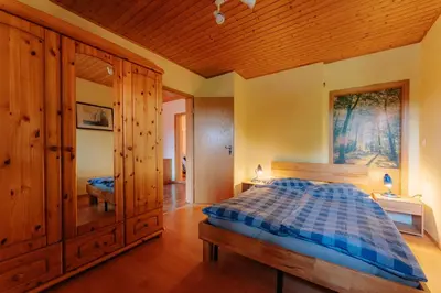 Ein Bett oder Betten in einem Zimmer der Unterkunft Apartments Carmen-Braunlage