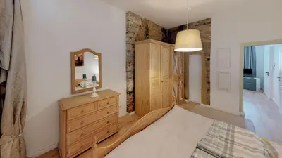 Ein Bett oder Betten in einem Zimmer der Unterkunft Ihr Zuhause am Jakobikirchhof