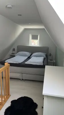 Ein Bett oder Betten in einem Zimmer der Unterkunft Ferienwohnungen am Köhlerhang Bad Lauterberg im Harz