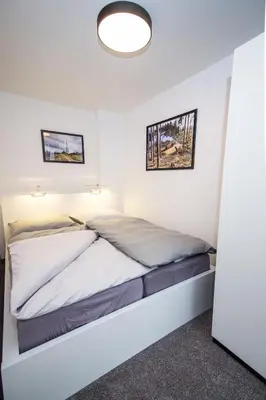 Ein Bett oder Betten in einem Zimmer der Unterkunft Ferienwohnung 