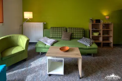 Ein Sitzbereich in der Unterkunft Auszeit-im-Harz Haus 6 Wohnung 3