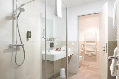 Ein Badezimmer in der Unterkunft Mythenresort Heimdall