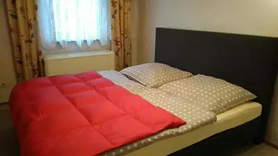Ein Bett oder Betten in einem Zimmer der Unterkunft Gästhaus