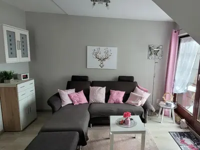Ein Sitzbereich in der Unterkunft Ferienwohnung LUNA Haus Sachsensteinblick, Wohnung über 2 Etagen