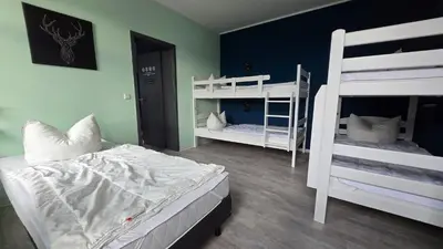Ein Bett oder Betten in einem Zimmer der Unterkunft Harz Hostel