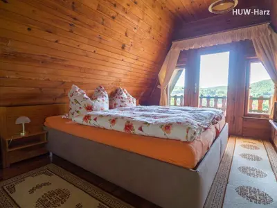 Ein Bett oder Betten in einem Zimmer der Unterkunft Finnhütte am Kapitelsberg