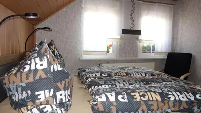 Ein Bett oder Betten in einem Zimmer der Unterkunft Ferienwohnung Köhlert