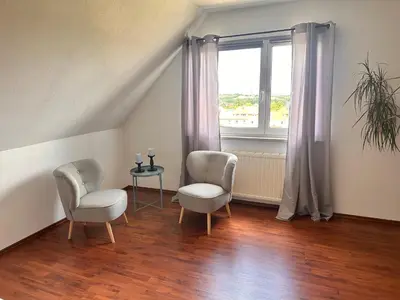 Ein Sitzbereich in der Unterkunft Ferienwohnung Harzdomizil