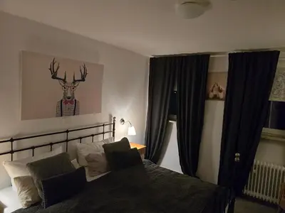 Ein Bett oder Betten in einem Zimmer der Unterkunft Pension Haus am Wald