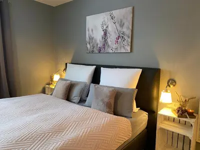Ein Bett oder Betten in einem Zimmer der Unterkunft Pension Haus am Wald