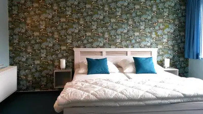 Ein Bett oder Betten in einem Zimmer der Unterkunft Am Mühlenberg