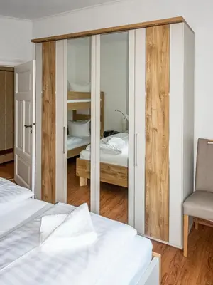 Ein Bett oder Betten in einem Zimmer der Unterkunft Ferienwohnung Margot