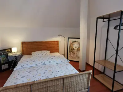 Ein Bett oder Betten in einem Zimmer der Unterkunft Ferienwohnung Loma