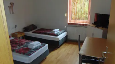Ein Bett oder Betten in einem Zimmer der Unterkunft Hostel Vorharz Quedlinburg