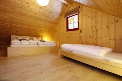 Ein Bett oder Betten in einem Zimmer der Unterkunft Ferienhaus in Schierke mit Garten