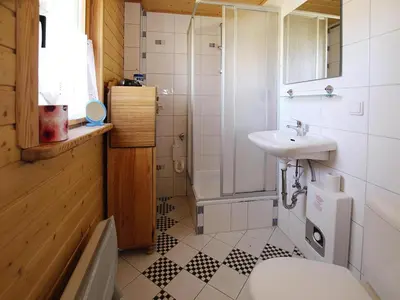 Ein Badezimmer in der Unterkunft Ferienhaus , Tanne