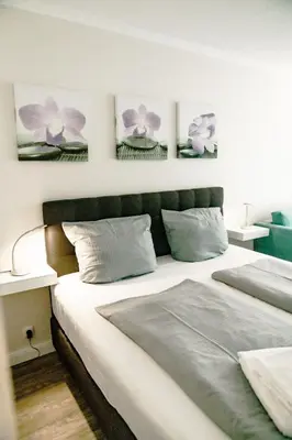 Ein Bett oder Betten in einem Zimmer der Unterkunft Haus am See HS 350