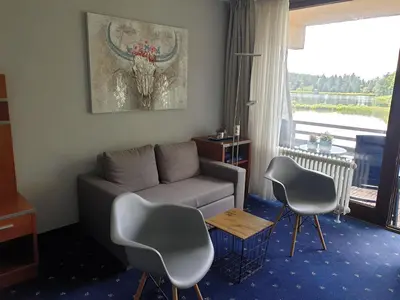 Ein Sitzbereich in der Unterkunft Apartment am Kranichsee Vier Jahreszeiten