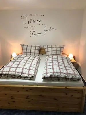 Ein Bett oder Betten in einem Zimmer der Unterkunft Ferienwohnung Cozy