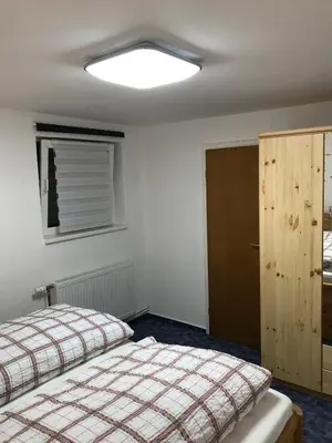 Ein Bett oder Betten in einem Zimmer der Unterkunft Ferienwohnung Cozy