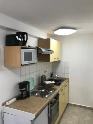 Küche/Küchenzeile in der Unterkunft Ferienwohnung Cozy