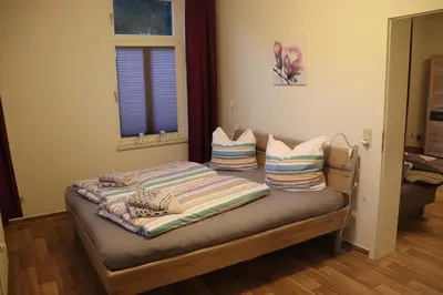 Ein Bett oder Betten in einem Zimmer der Unterkunft Ferienwohnung Berthold WG 3