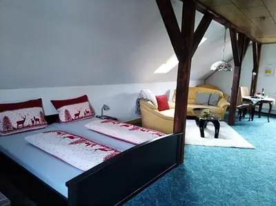 Ein Bett oder Betten in einem Zimmer der Unterkunft Apartments & Ferienhaus Senftner