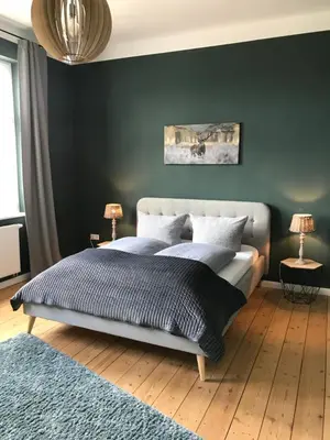 Ein Bett oder Betten in einem Zimmer der Unterkunft Villa Hanne mit Garten
