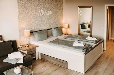 Ein Bett oder Betten in einem Zimmer der Unterkunft Haus am See HS 597