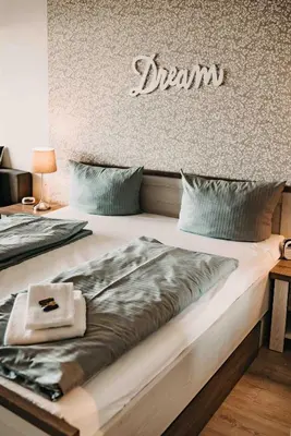 Ein Bett oder Betten in einem Zimmer der Unterkunft Haus am See HS 597