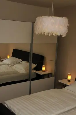 Ein Bett oder Betten in einem Zimmer der Unterkunft Apartments am Brunnen